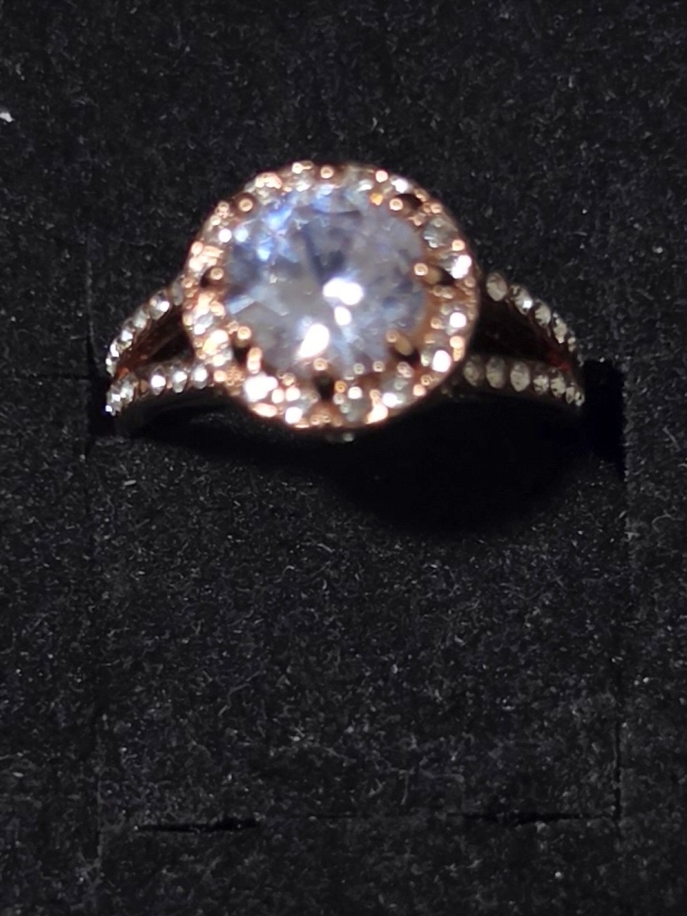 Rose Gold Halo Split-Shank Ring with Clear Center Stone